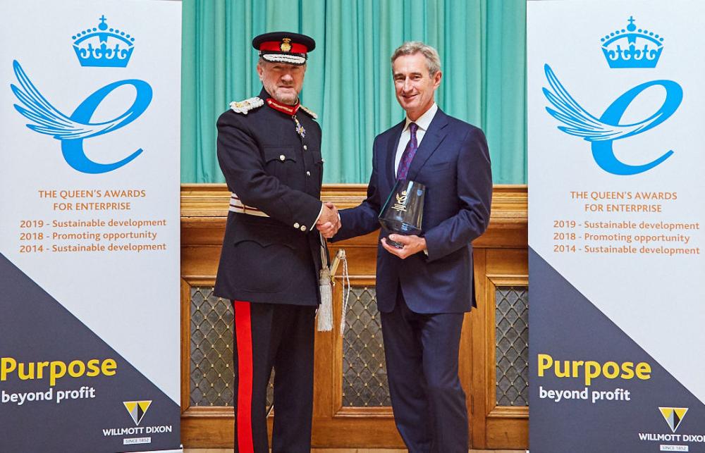 Lord-Lieutenant of Hertfordshire presenting a scroll to Willmott Dixon Chief Executive, Rick Willmott