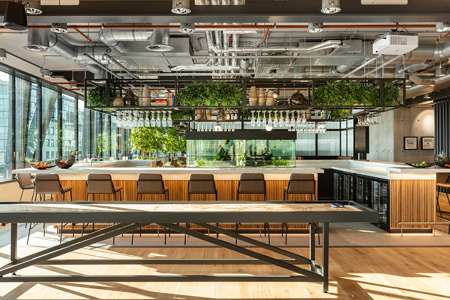 Bar and recreational area at Alpha FX by Modus