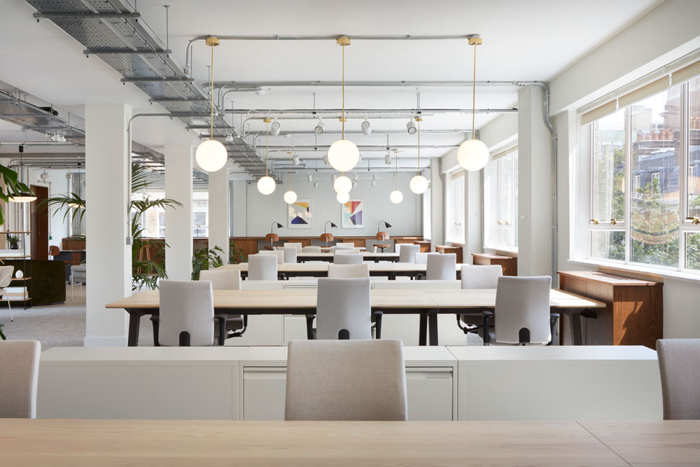 dmfk derwent london rows of desks in bright room