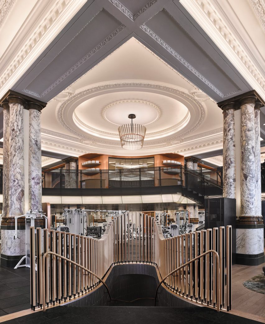 Stairwell leading to gymnasium as part of a department store development