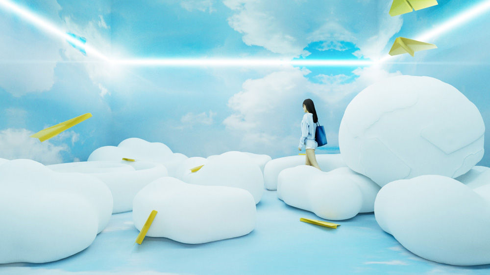 Woman walks through inflatable clouds at the Is email dead? a new design museum exhibition